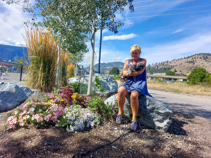 Debbie and her puppy, Kismet at the Kelowna Rail Trail homeless encampment (Jacqueline Gelineau/Capital News)