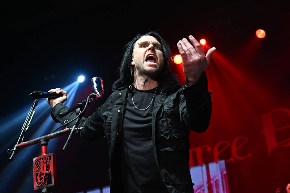 Three Days Grace frontman Matt Walst beckons to the crowd at the South Okanagan Events Centre on Nov. 10. (Brennan Phillips - Penticton Western News)