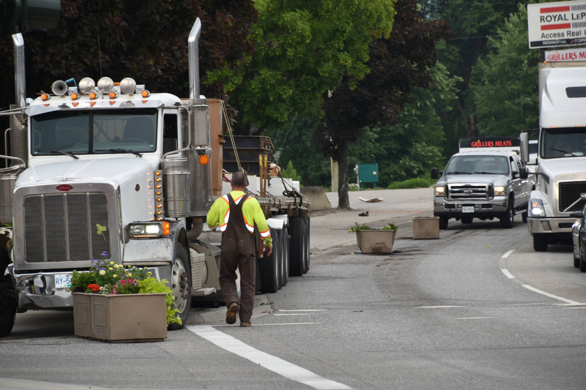 33029158_web1_230621-SAA-transport-truck-hits-planters