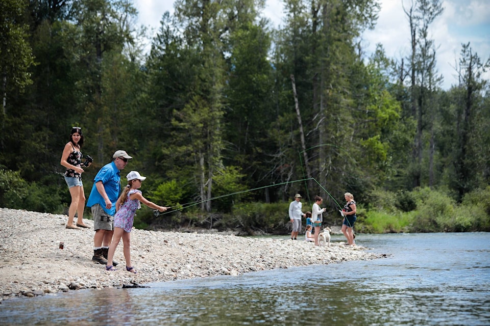 Families spend time together during learn to fish day at the Kingfisher Interpretive Centre. (simplymastery file photo)