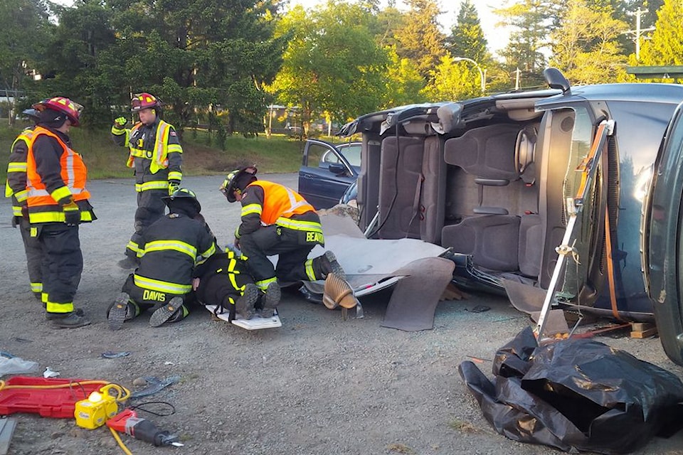 Sooke firefighters sharpen their skills in a simulated traffic accident response. Since moving to a 24/7 service model one year ago, Sooke Fire Rescue has significantly reduced emergency response times, enhancing both public safety and operational efficiency, according to Fire Chief Wayne Kennedy. (Sooke Fire Rescue/Facebook)