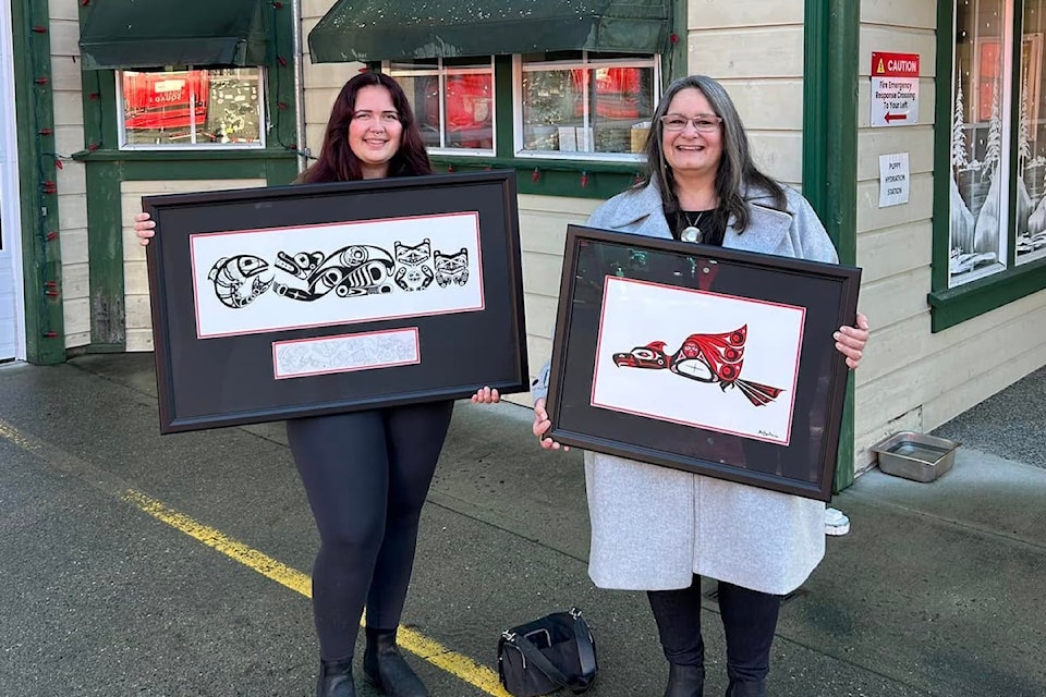 T'Sou-ke First Nation artists Isabelle St. Pierre and Shelley Davies with their designs for Sooke Fire's truck.