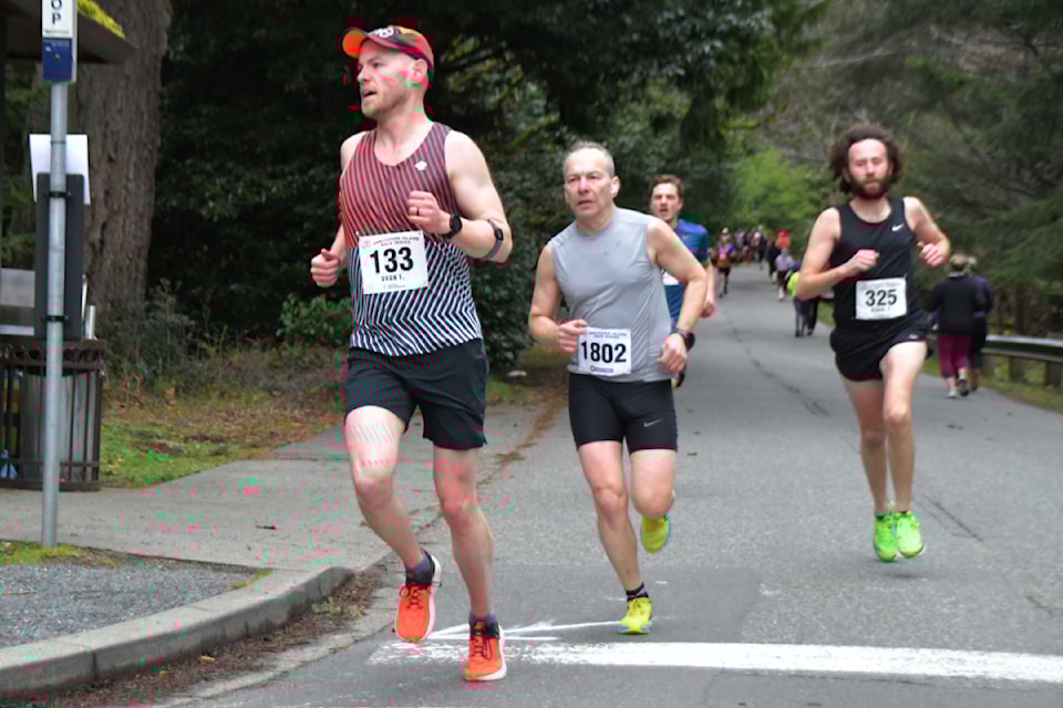 Runners make their way around the grounds of Hatley Castle during the Hatley 8K road race in 2024. This year's race is on Sunday, Feb. 23. (Photo submitted)