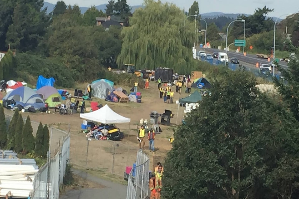 13747855_web1_SNE_TentCity_cleanup