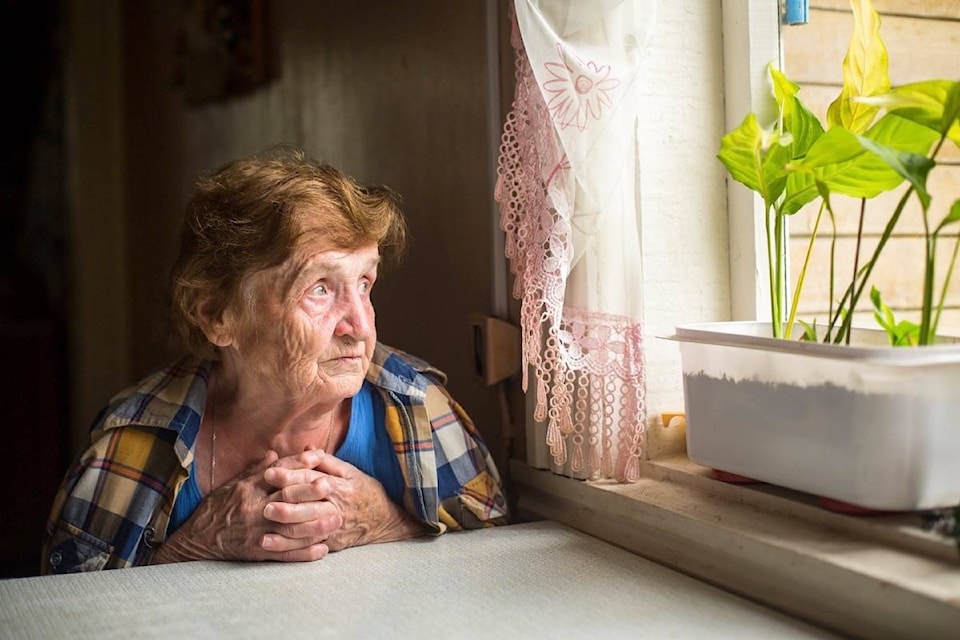 18041354_web1_190808-SNM-M-Senior-Social-Isolation-Elderly-Woman-Looking-Out-The-Window