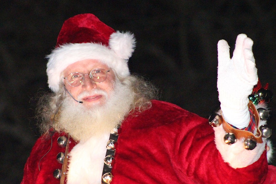 Santa took part in the parade and then made his way to Centennial Square for milk and cookies with everyone. (Devon Bidal/News Staff)