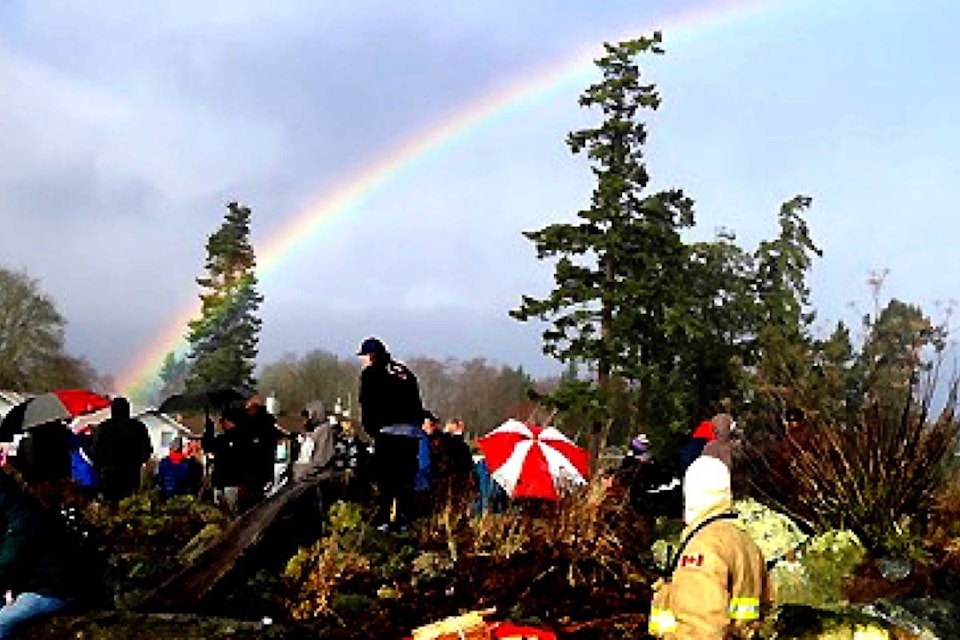 The day started out cool and rainy but by the end of the polar bear dip, a rainbow appeared. (Contributed photo)