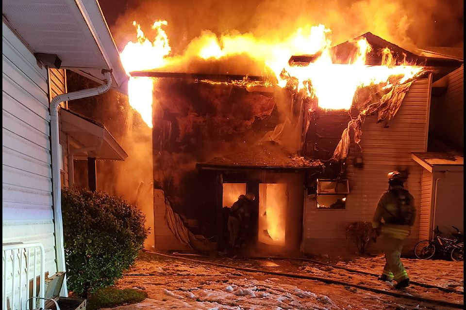 A fire destroyed several unites at a housing complex on Auchinachie Road Tuesday night. (Damian Joulie photo)