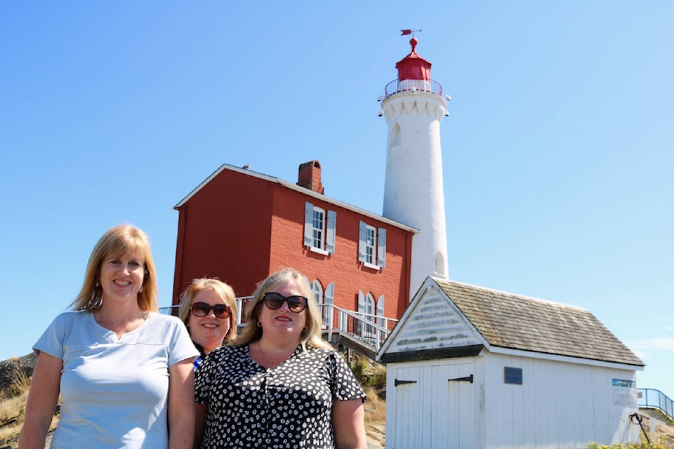 Sisters Nadine Ryan (left to right), Jill Luther and Dawn Le Feuvre dropped by the Fisgard Lighthouse in Colwood on Monday afternoon. (Aaron Guillen/News Staff)