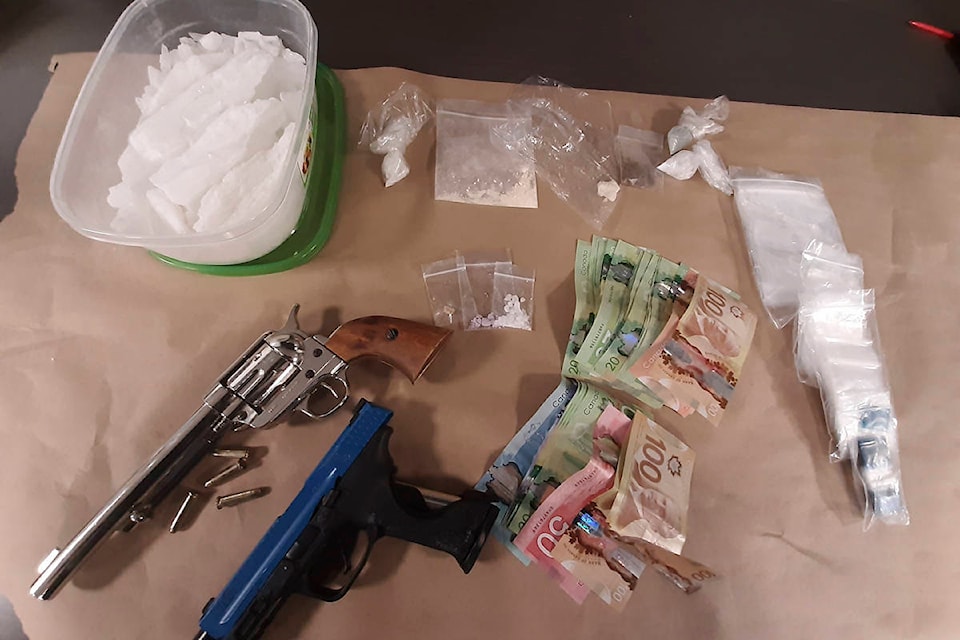 23899771_web1_210112-VNE-DrugsCashFirearms-Seized-VicPD_1