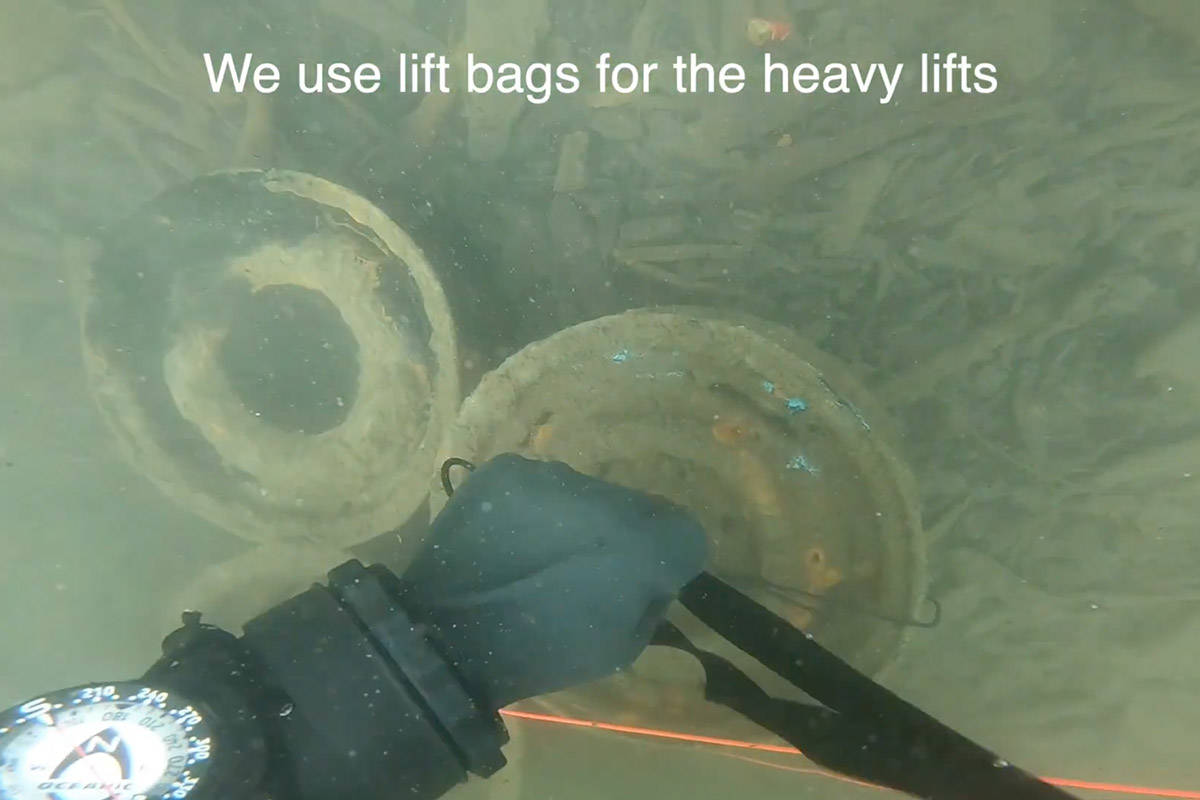 These car rims that were removed from Cultus Lake was part of the 470 pounds of trash four members with Divers for Cleaner Lakes and Oceans hauled out March 28 and 29, 2021. (YouTube/Henry Wang)