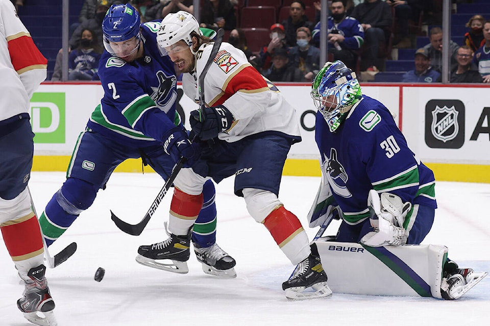 27911487_web1_220121-CPW-Panthers-Canucks-panthers_1