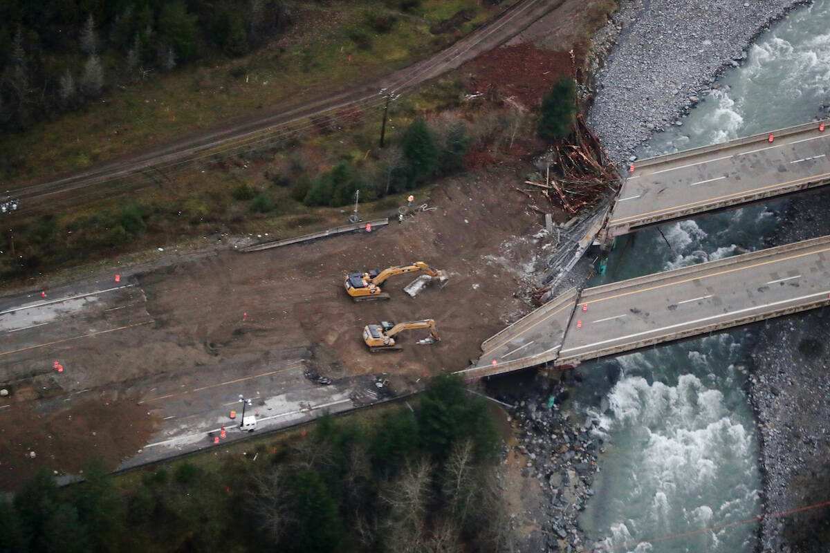 Work was being done on a section of the Coquihalla Highway after damage was caused by heavy rains and mudslides north of Hope on Monday, Nov. 22, 2021. (THE CANADIAN PRESS/Darryl Dyck)