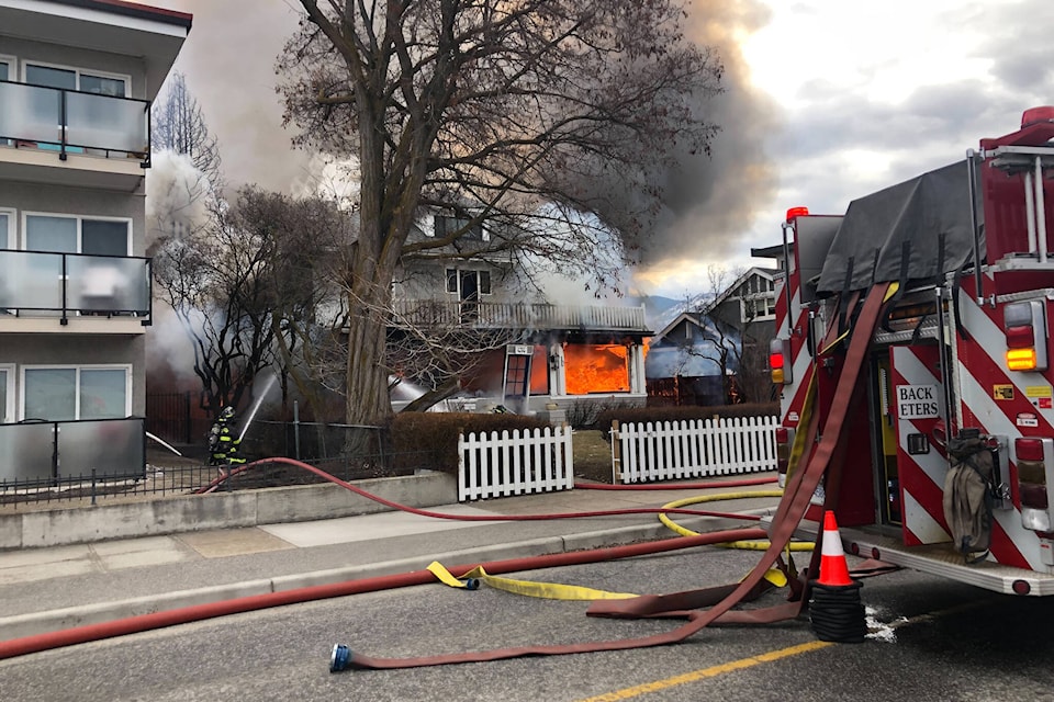 Firefighters in Penticton are at a fire on Lakeshore Drive. A house in the 400 block has exploded and the top floor has collapsed. (Monique Tamminga/Penticton Western) Firefighters in Penticton are at a fire on Lakeshore Drive. A house in the 400 block has exploded and the top floor has collapsed. (Monique Tamminga/Penticton Western)