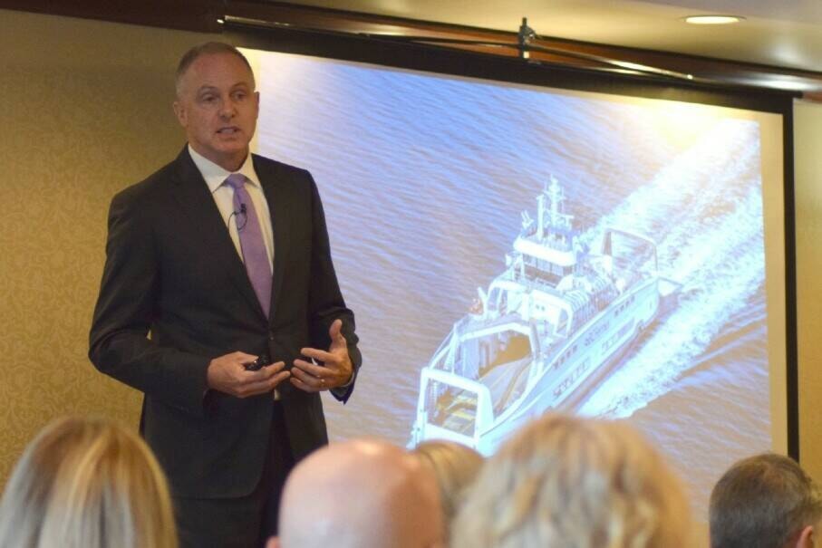 BC Ferries CEO Mark Collins addresses business leaders, politicians and military personnel invited to the Greater Victoria Chamber of Commerce’s May 12 business leader luncheon. (Kiernan Green/News Staff)