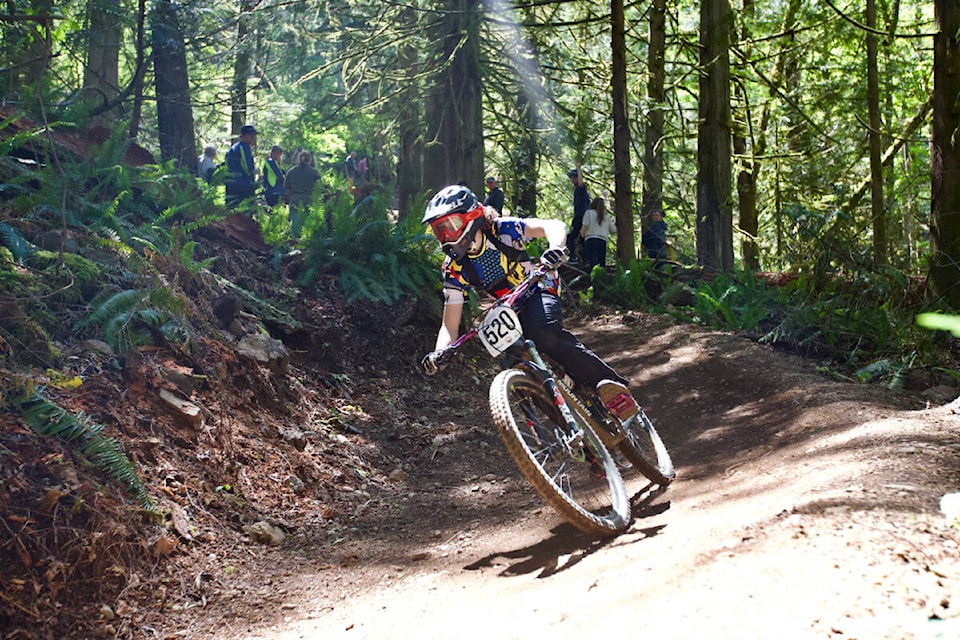 A rider makes their way down the trail during the 2022 B.C. School Sports High School Mountain Biking Provincial Championships at the Jordie Lunn Bike Park in Langford on May 27. (Justin Samanski-Langille/News Staff)