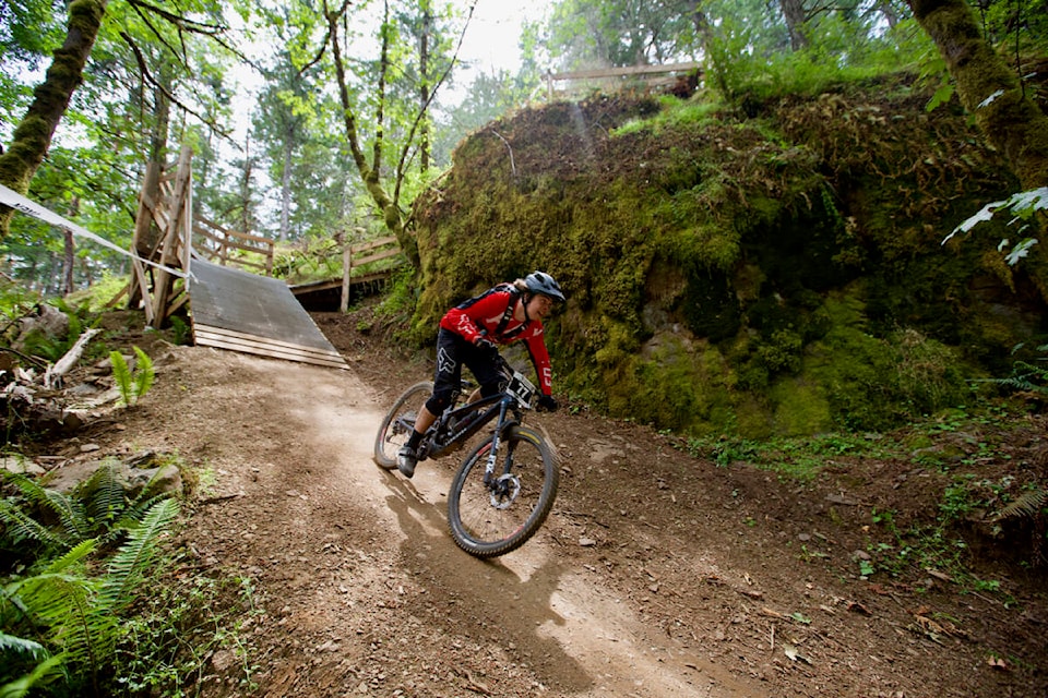 A racer descends a steep slope Saturday (July 2) during the Live Like Jordie Enduro at Jordie Lunn Bike Park in Langford. The race, part of the Island Cup Enduro Series, was one of the events at the two-day-long Langford BikeFest. (Justin Samanski-Langille/News Staff)