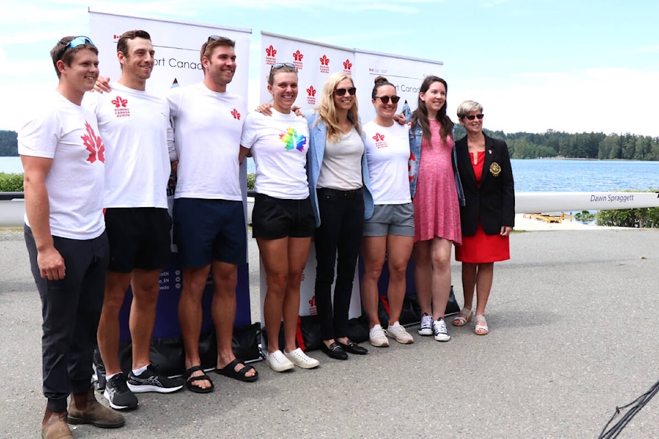 Members of Canada’s national rowing program gather for a photo with federal Minister of Sport Pascale St-Onge (centre, in pants), following a funding announcement July 5 benefiting grassroots rowing programs and the new national team training facility in the Cowichan Valley. (Don Descoteau/News Staff)