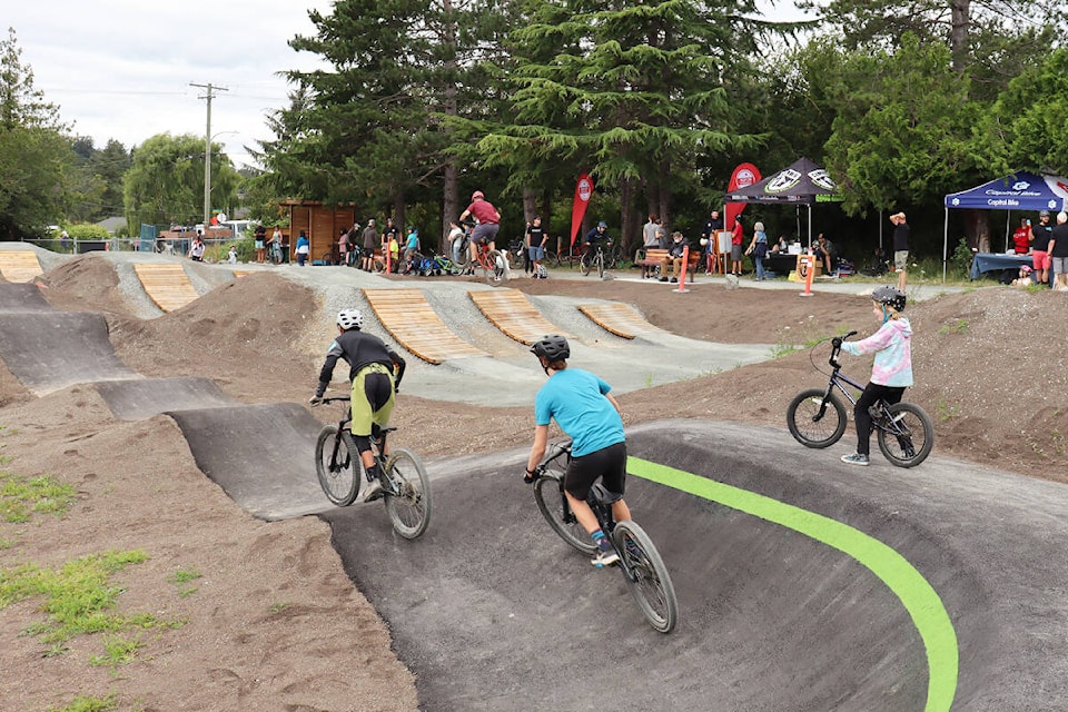 Enthusiastic mountain bike riders traverse the newly opened Tripp Youth Bike Skills Park in Saanich. The facility officially opened Saturday (July 16) and is expected to be popular with riders of all ages this summer. (Courtesy District of Saanich)