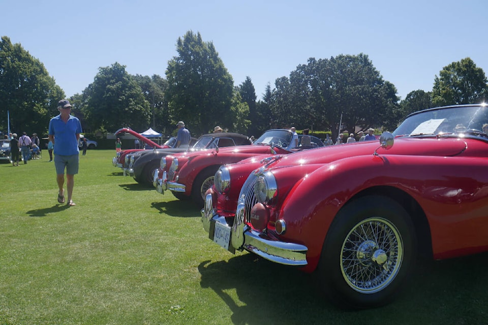 Classic British vehicles line the field for Jaguars on the Island at Windsor Park on Saturday (July 23). (Evert Lindquist/News Staff)