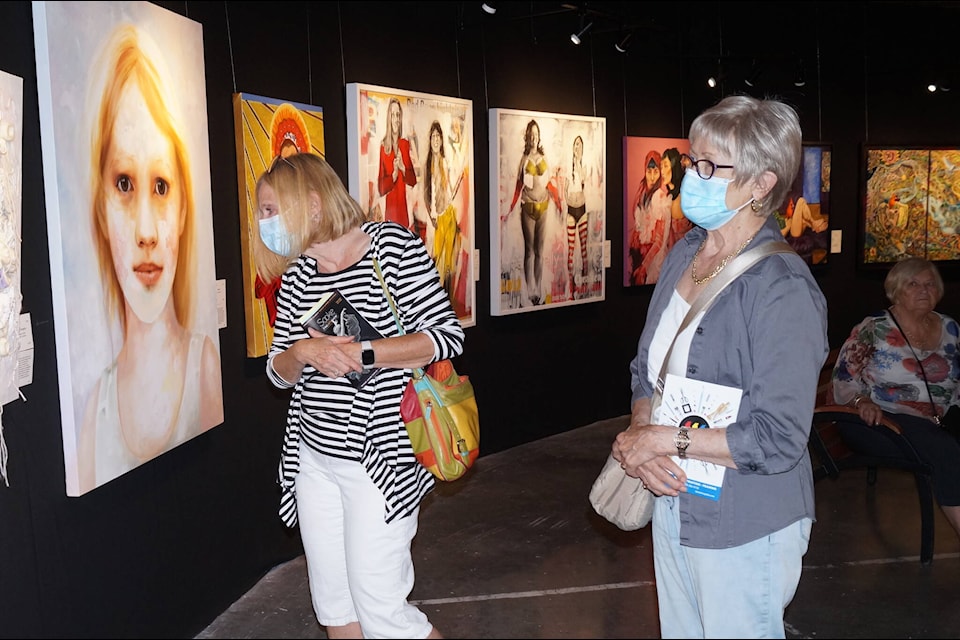 The opening day of the Sooke Fine Arts Show drew an appreciative crowd of art lovers and onlookers. (Rick Stiebel-Sooke News Mirror)