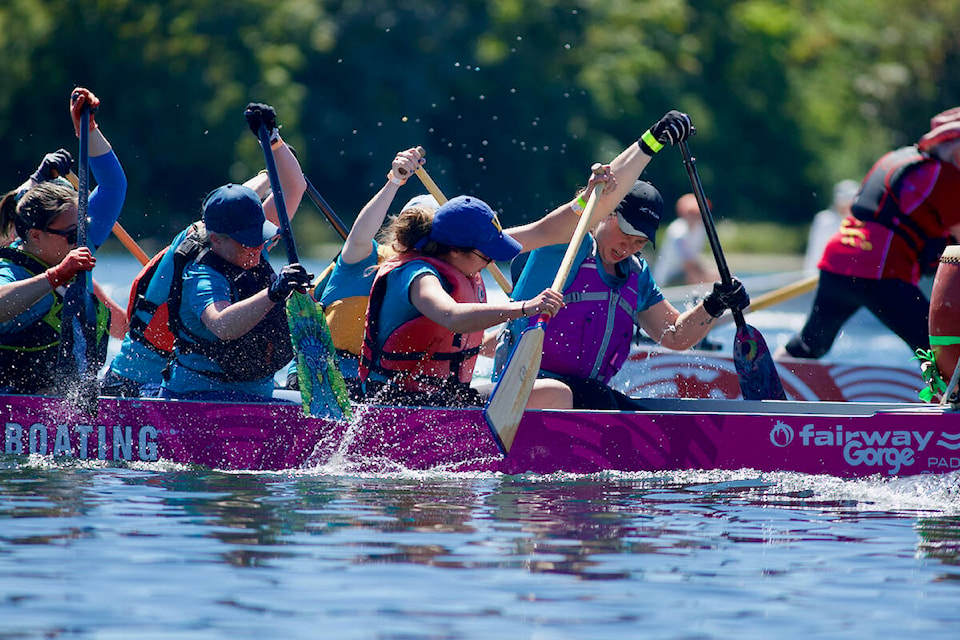 Dragon boat teams paddle toward the finish line Saturday during the first day of the inaugural Vancouver Island Dragon Boat Festival. (Justin Samanski-Langille/News Staff)