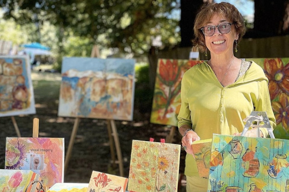 Mixed media artist Nancy Dolan shows her work at the 17th annual Bowker Creek Brush-Up Art Show and Sale in Oak Bay on Aug. 14. (Photo by Joanie McCorry)