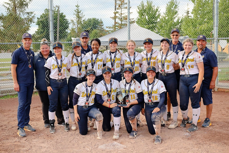 Langford Lightning U17A Girls won their first ever national softball championship in Montreal between Aug. 17 and 21. Back row: Chad Bryden, Joni Frei, Kamryn Allin, Makena Aune, Dale Aune, Brynn Fortier, Peyton Bryden, Kaliyah St. Amand, Mason Barclay, Jenna Lehman, Rob Guenter, Ruby Anderson, Rob Haslam. Front Row: Marin Jorgenson, Kaela Gillis, Emma Pepin, Courtney Haslam. (Courtesy of Elizabeth Bryden)