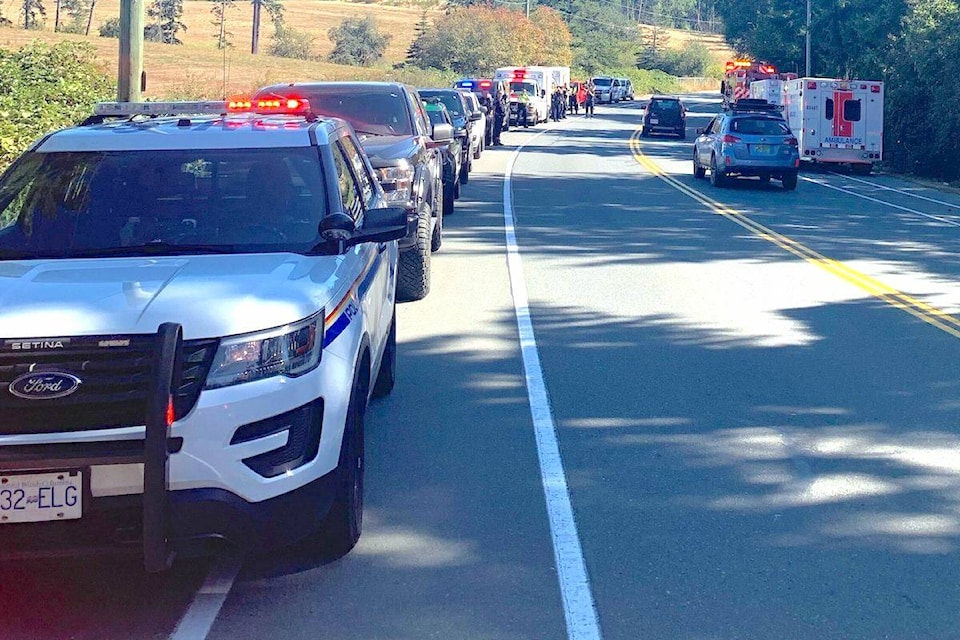 First responders line up outside Victoria General Hospital on Sept. 7 as the last of six officers injured in a June 28 shooting outside a Saanich bank was released from the hospital. (Submitted photo)