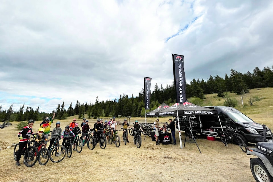 Some of the mountain bikers attending the Jesmond trail grand opening on Aug. 27 and the Rocky Mountain Bicycles demo team at the Big Bar Ranch, where many were camped to celebrate the trail opening event. (Ruth Lloyd photo - Black Press Media)