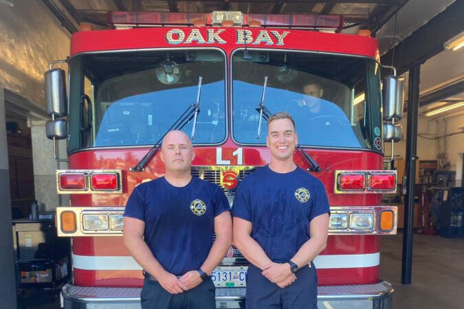 Firefighters Cameron Young and David Mathieson join the team in Oak Bay. (Oak Bay Fire Department/Twitter)