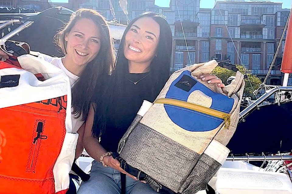 Salt Legacy business partners Tisha Becker (left) and Meaghan McDonald with some of their backpacks made from sailcloth. (Courtesy of Salt Legacy)