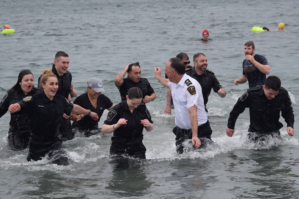 Members of the Saanich Police Department took part in the Vancouver Island Polar Plunge for Special Olympics BC Sunday (Feb. 19). (Brendan Mayer/News Staff)