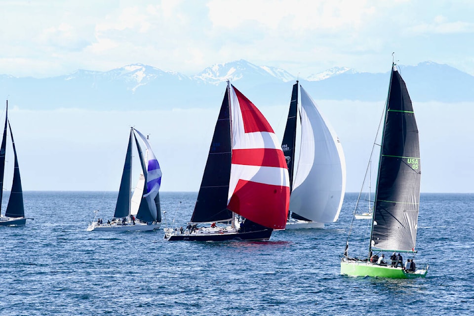 Racers cruise by as their sails catch the wind Saturday, May 27 at the start of the 2023 Swiftsure International Yacht Race off Clover Point in Victoria. (Justin Samanski-Langille/News Staff)