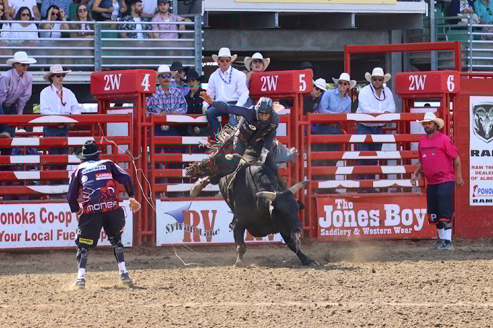 Griffin Koester of Rockyford, Alta. rides to no avail, earning no score in the bull riding at Ponoka Stampede on June 29.