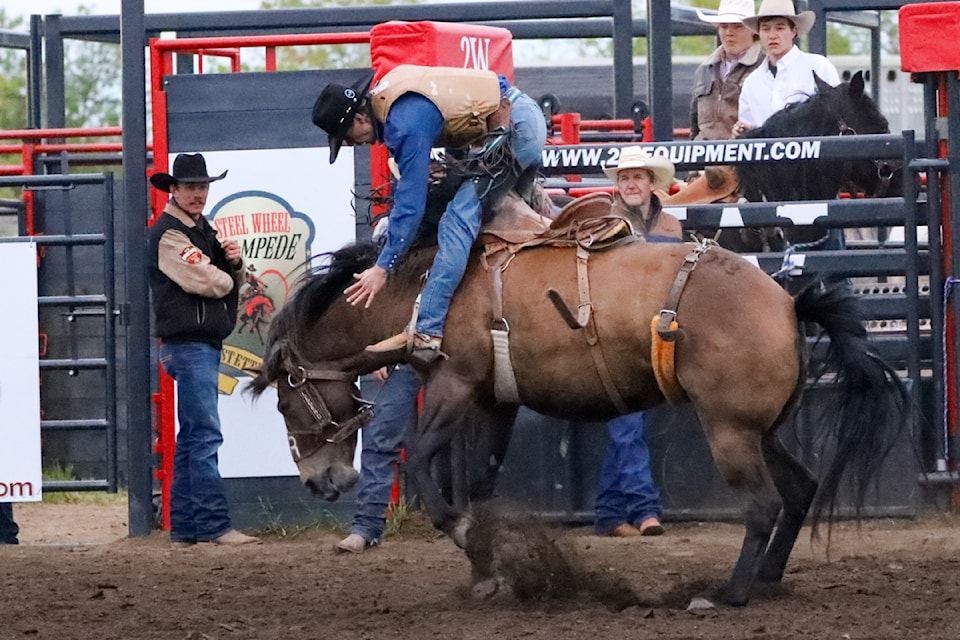 Brieley Scott has his ride terminated early by a bronc named Dream On.
