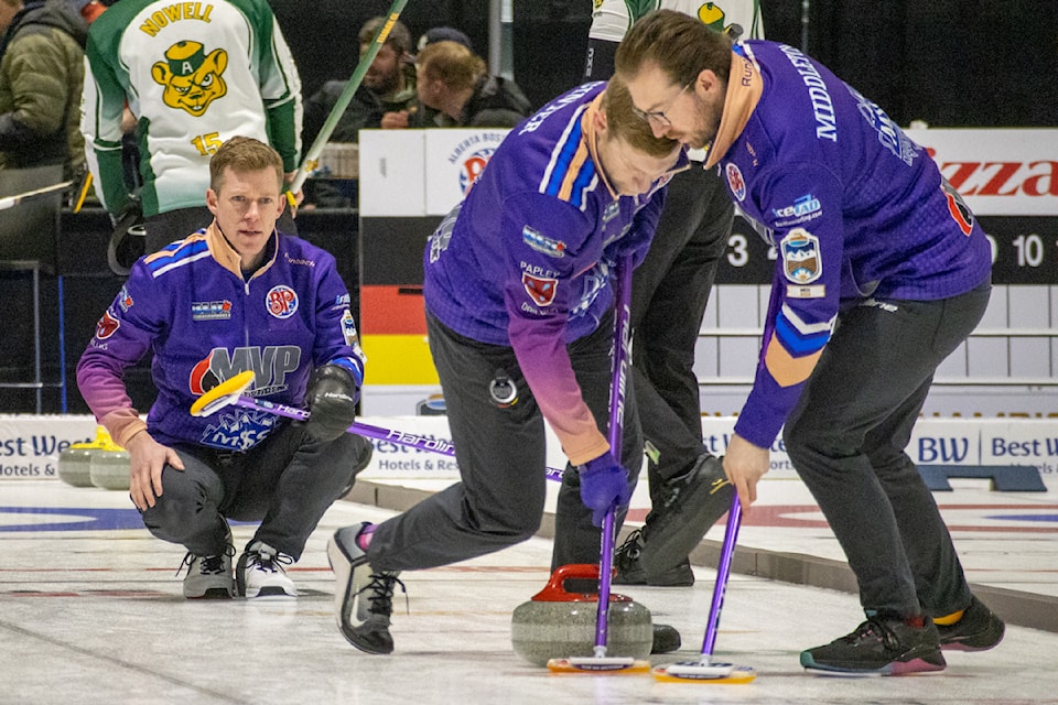 Team Van Amsterdam throws a stone early in the second end of Draw 7 at the Boston Pizza Cup. 