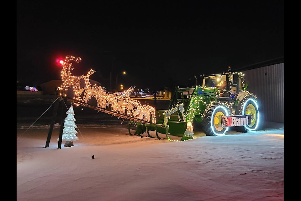 Rudolph prepares to guide Santa’s…tractor?!?! just one of the many impressive displays at this year’s “Light the Night” event. On average, 100 vehicles are going through per night according to organizers. (Photo submitted)