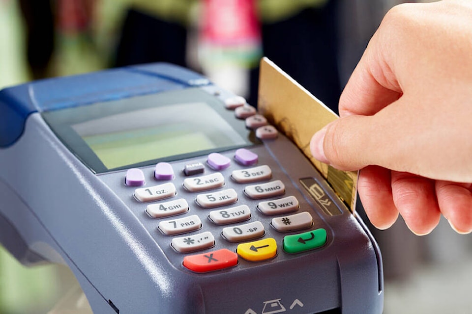 30984577_web1_debit-card-machine