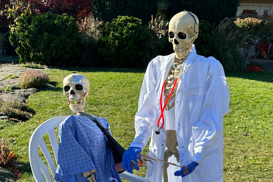 Slim and Boneita, the Peskelly Family skeletons, are active from their home in Trout Creek in Summerland. The skeletons make their appearance every year in October. (John Arendt/Summerland Review)