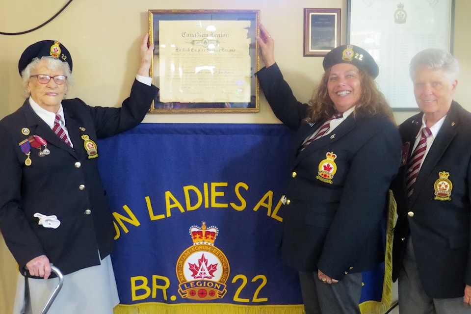 Marion Pshyk, left, Wendie Maguire and Myrna Wicker show the original 1927 Branch 22 Ladies Auxiliary charter. The charter is now on display at the Summerland Legion. (Contributed)