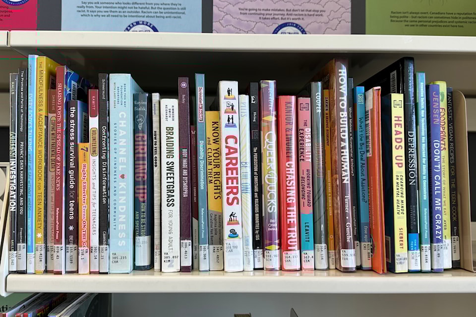 Books in the young adult section of the Summerland branch of the Okanagan Regional Library address many topics. Some books on the shelves have attracted scrutiny from some library patrons. (John Arendt/Summerland Review)