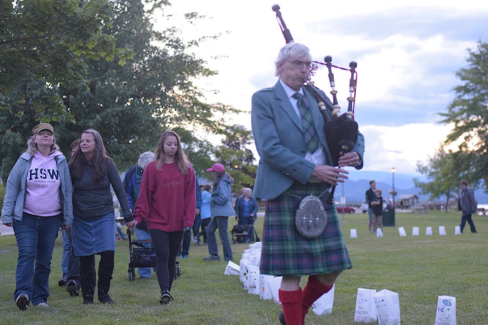 17227732_web1_190612-SAA-Luminary-walk-piper