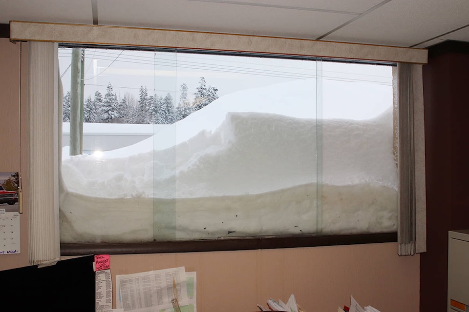 Heavy snowfall cracked a window at the Kitimat Northern Sentinel on Sunday, Jan. 19, 2020, unleashing an avalanche 12 feet into the newsroom. (Gerry Leibel/Northern Sentinel)