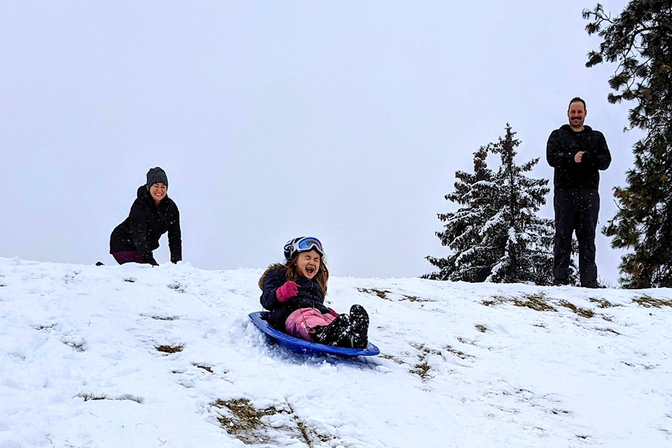 6-year-old grade one student Emily Ruth was one of the many children out enjoying a day of sledding at Columbia Elementary School after the winter’s first snowfall in Penticton Monday, Dec. 21, 2020. (Jesse Day - Western News)
