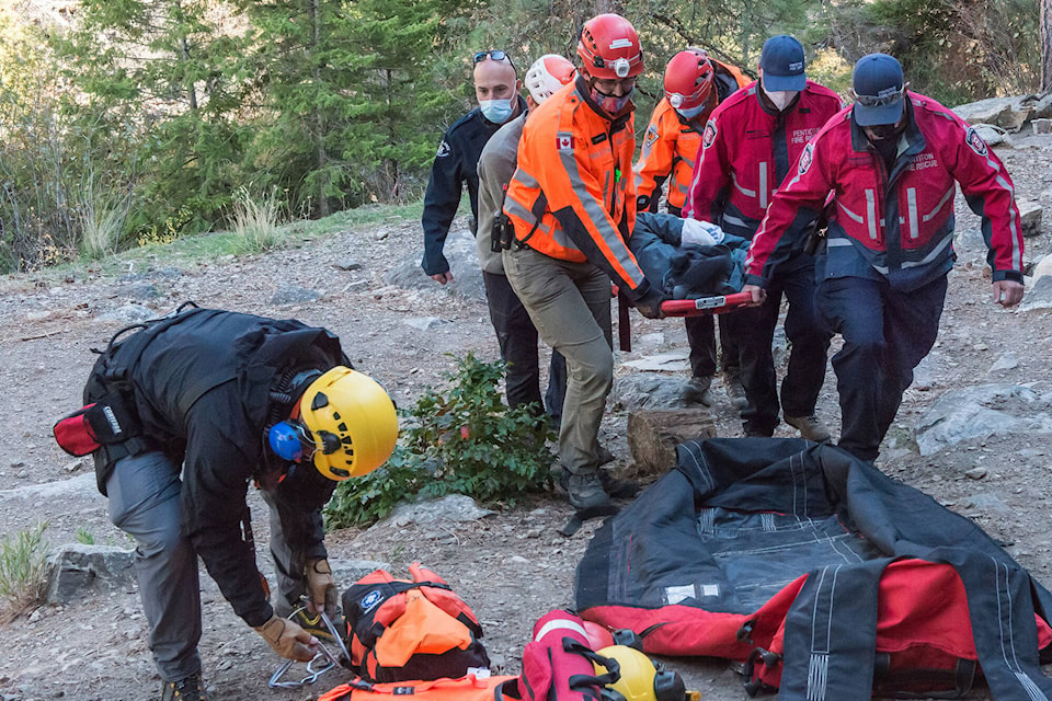 An injured climber is prepped for being rescued via helicopter. (Mike Biden photo)