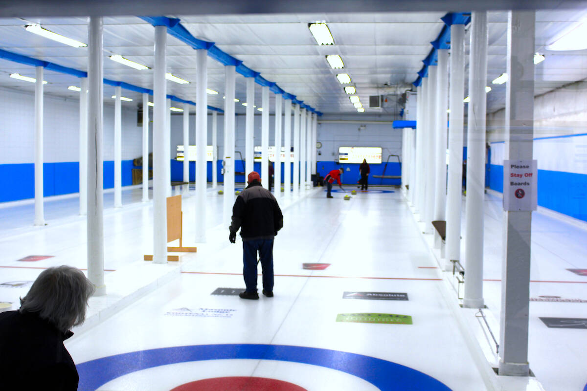 Clarence Boettger in action at the Revelstoke Curling Club. (Josh Piercey/Revelstoke Review)