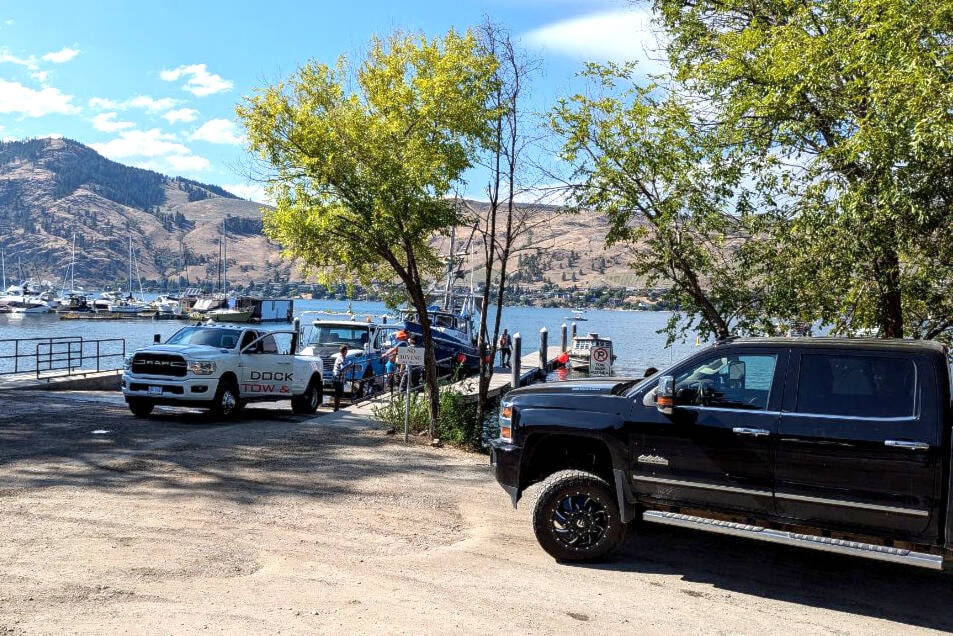 The boat that capsized on Okanagan Lake July 24 was finally recovered Aug. 1 and pulled out at Paddlewheel Park. (Contributed)