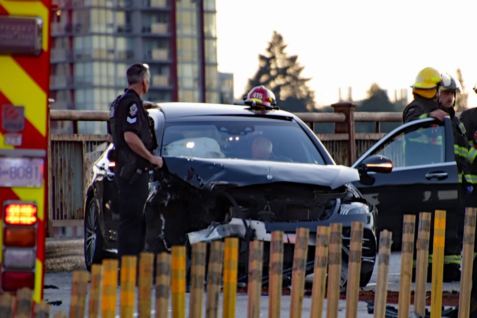 A two-vehicle crash on the Pattullo Bridge Sunday evening sent two people to hospital.