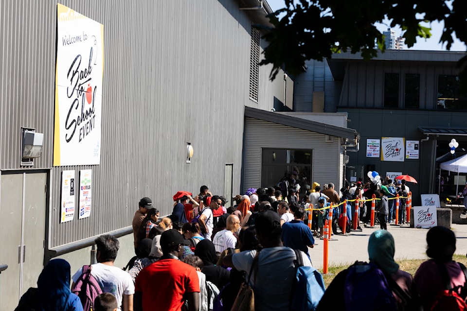 The City Dream Centre handed out backpacks and school supplies during an event Saturday, Aug. 17 at Kwantlen Park Secondary School in Surrey. 
